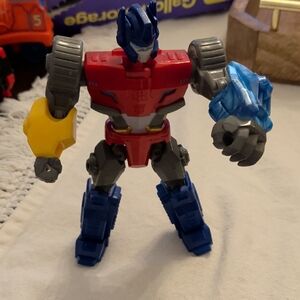 Optimus Prime Transformers Robot Action Figure - Red, Blue, and Gray